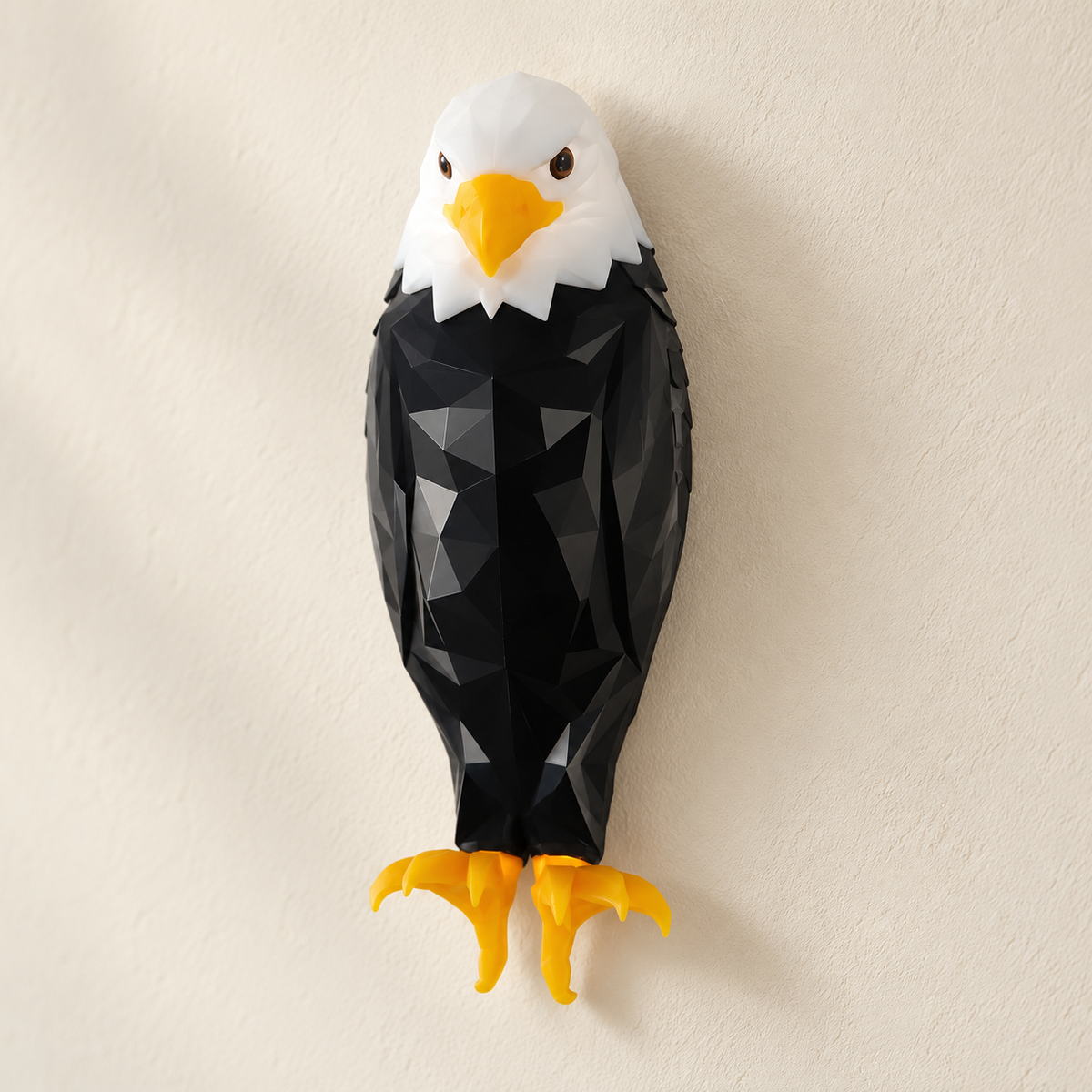Billhol® faceted bald eagle wall light switched off in natural daylight